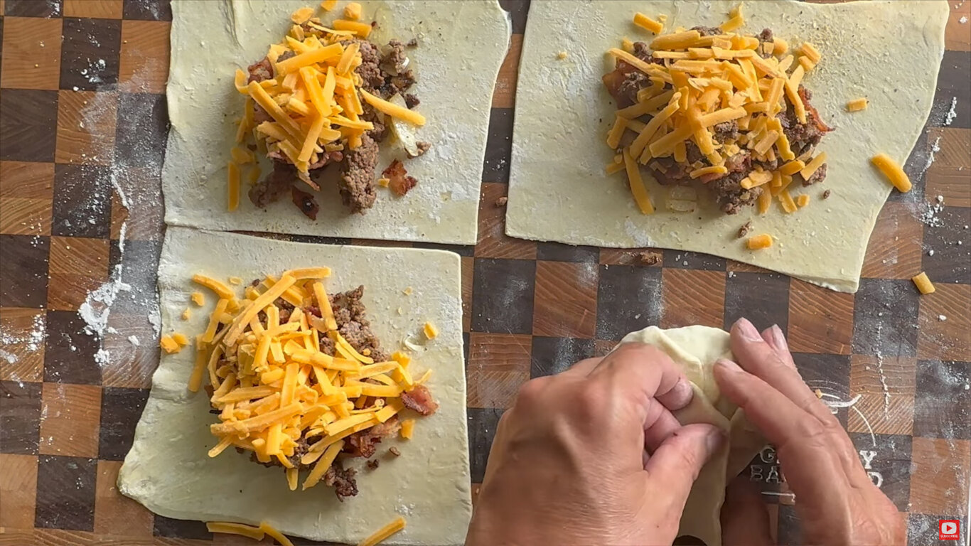 Bacon Burger Bomb being folded shut