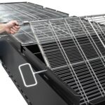 Double-Sided Pivoting Stainless Steel Grates on BBQ144 Chicken Cooker Trailer