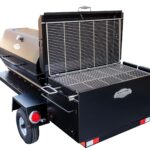 BBQ42 Double-Sided Grate Hooked Onto Lid on Caterer's Delight Trailer